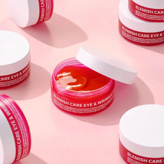 Photo sur fond rose de plusieurs produits : Blemish Care Eye & Wrinkle de chez Dr.different