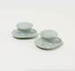Duo d'outils de massage facial en pierre de jade naturelle, forme ergonomique champignon pour un soin décongestionnant effet spa.