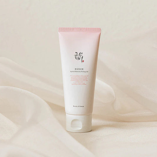Tube de gel exfoliant L'Apricot Blossom Peeling Gel BEAUTY OF JOSEON surligneur en soie crème.