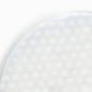 Gros plan sur la texture alvéolée d'un disque de coton ZISU'C. Le pad est saturé de sérum Galacthione pour une exfoliation douce et une hydratation intense de la peau.