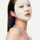 Mannequin portant sur le visage le masque gel Radiant Vita Niacinamide Real Deep Mask.
